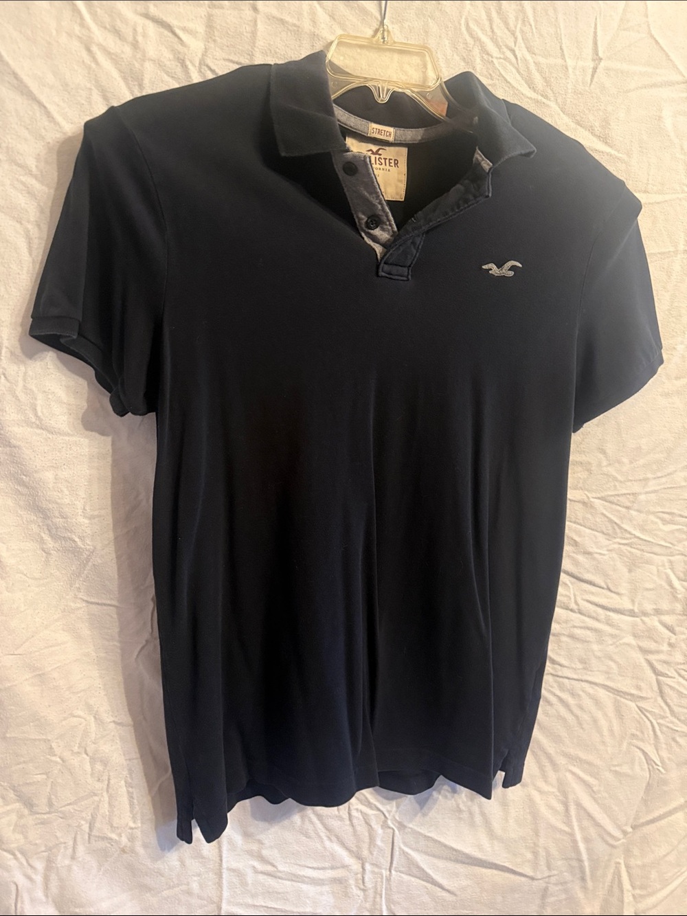 Hollister Men's Navy Blue Polo with Embroidered Seagull